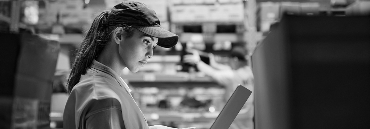 woman reviewing performance data using Caljhan Connect: System Insights